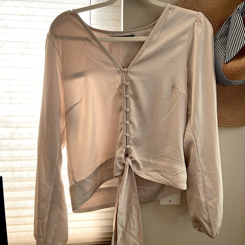 Cream colored blouse from Abercrombie with bottom tie